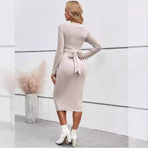 Back view of the Apricot MUTINI ribbed maternity dress showing the waist tie.