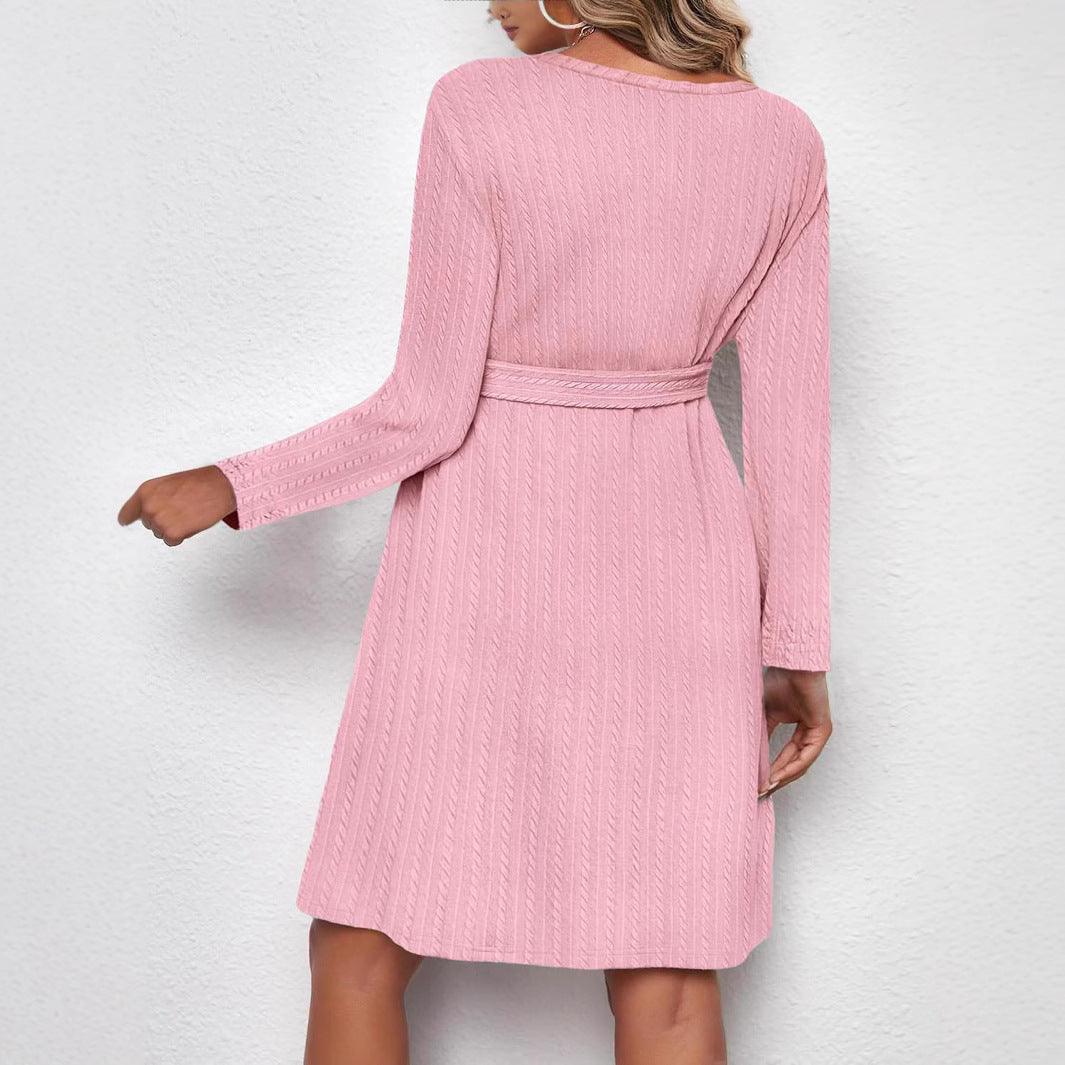 Back view of the MUTINI™ Luxe Maternity Midi Dress showcasing long sleeves and adjustable tie-waist in pink.